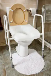 Raised toilet seat for handicap person